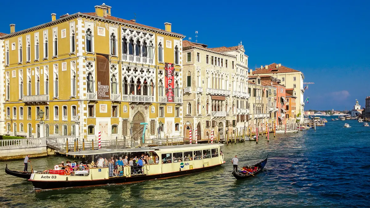 ACTV Vaporetto Line 1 water bus on the Grand Canal, Venice, Italy.