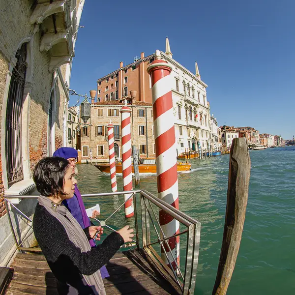 Barbara Cavalieri shows off the view from Ca' Foscari University's water landing on the Grand Canal in Venice, Italy.