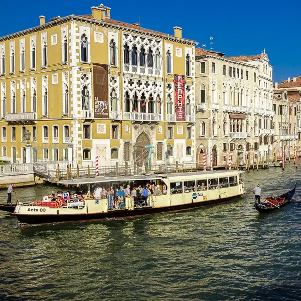 ACTV Vaporetto Line 1 water bus on the Grand Canal, Venice, Italy.
