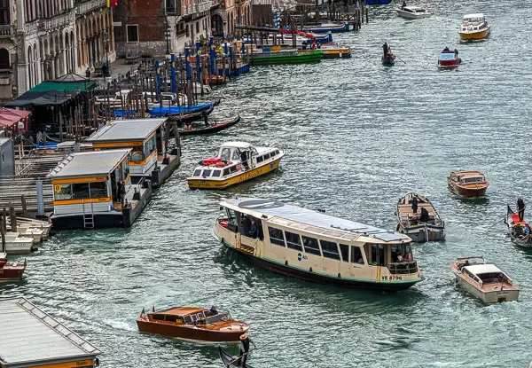 Water buses and other boats on the Grand Canal from the Fondaco dei Tedeschi roof terrace.