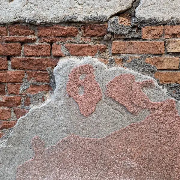 Venice's buildings are mostly made of brick with layers of plaster that may or may not be intact.